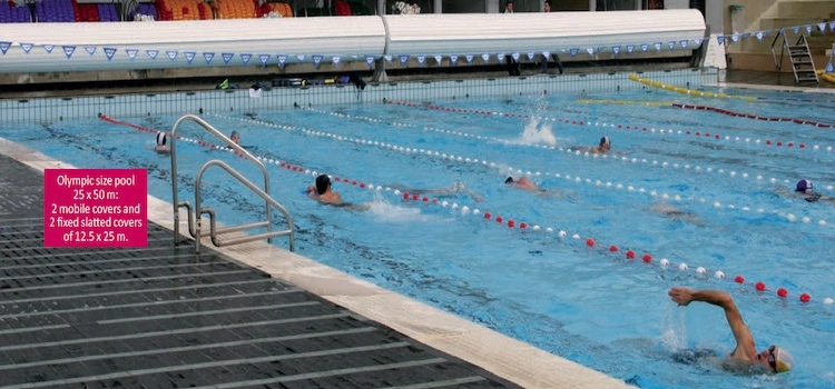 Above-water slatted cover for large swimming pools