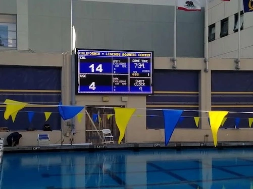 Timing and scoring system for competitive swimming pools
