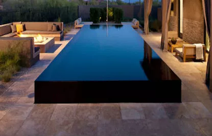 Mirror pool reflecting the sky and surrounding environment for a serene effect